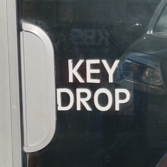 A key-drop where customers can drop off their keys if the shop is closed
